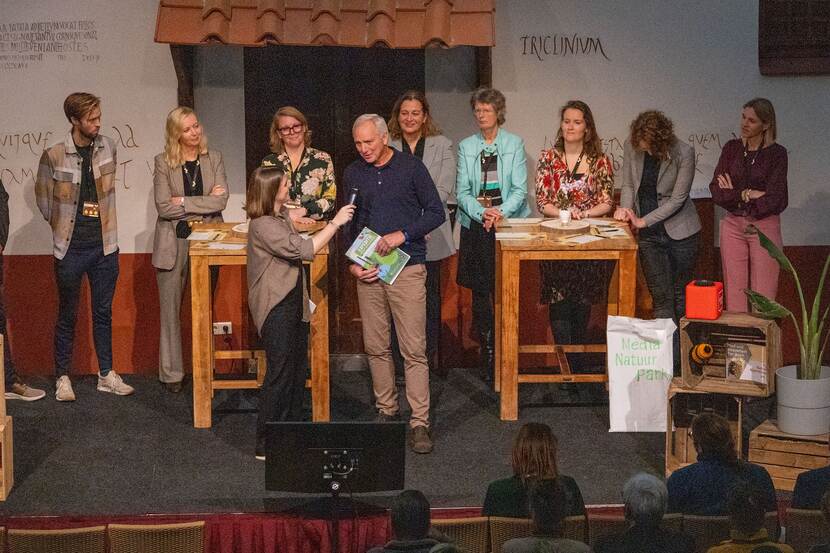 Ben Bus is aan het woord op het podium tijdens de voorstelronde van nieuwe NBS-partners op het event 5 jaar Nationale Bijenstrategie